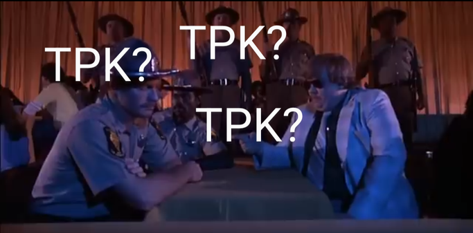 John Candy from ‘Blues Brothers’ sitting at a table with three cops, adding each in turn, “TPK?”